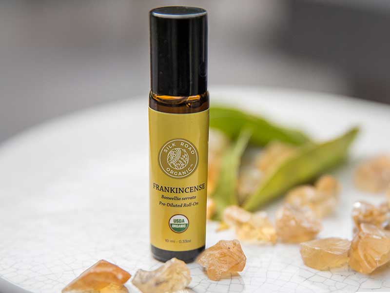 frankincense essential oil roll-on bottle amber gold resin