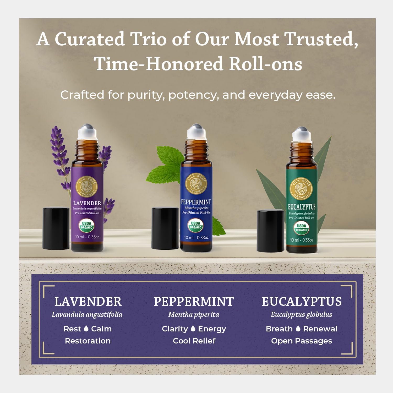 the signatures essential oil roll-on gift set box with gold bow and peppermint eucalyptus and lavender roll-ons