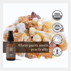 Bottle of frankincense oil with frankincense resin on a white background, featuring USDA Organic and Non-GMO labels.