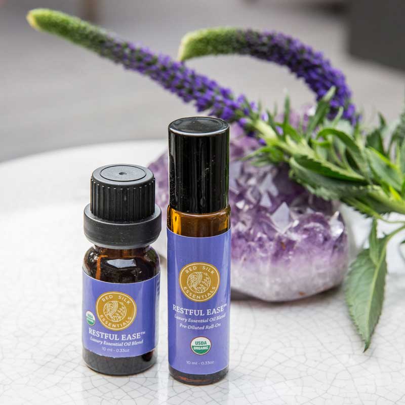 essential oils for a better night's sleep restful ease organic essential oil blend undiluted bottle and roll-on