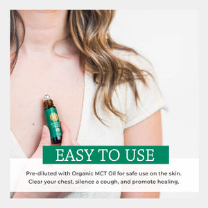 Person holding a bottle of organic eucalyptus essential oil with text about its use on skin. easy multipurpose apply roll on inhal vapor diluted safe soothe muscle ache neck pain