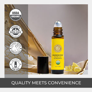 Roll-on bottle of frankincense essential oil with USDA Organic and Non-GMO labels on an elegant, neutral background. pure sustainable harvest rare sacred certified roller amber glass bottle coconut oil