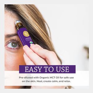 Person applying a lavender rollerball to their face with text about its ease of use and benefits. safe easy wear fractionated coconut apply directly skin relax inhaling bedtime