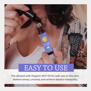 Person holding a bottle of essential oil with text about its use and benefits. easy topical dilute fractionated coconut oil safe use apply skin pillow